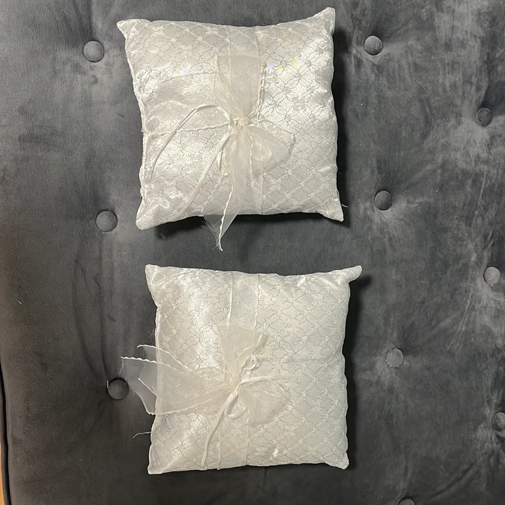 2 white satin and lace ring pillows. Never used! Smoke and pet free home.